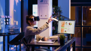 future of marketing- Young woman working with VR glasses