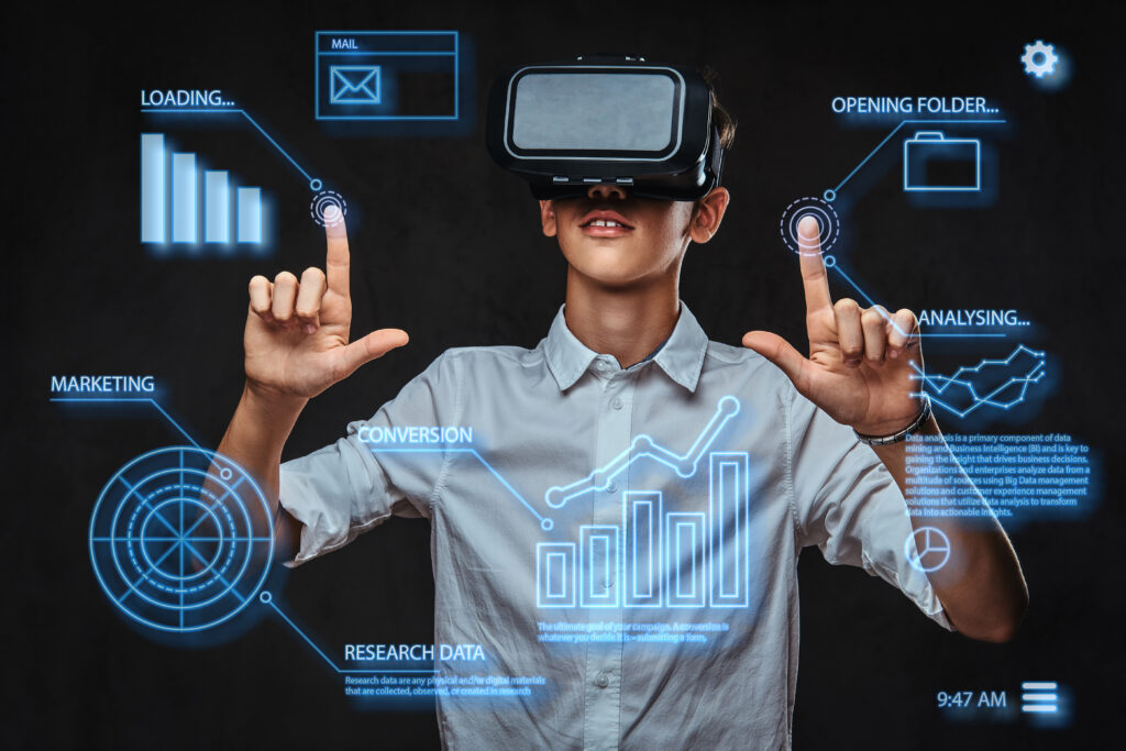 Teenager wearing white shirt using VR glasses with graph charts etc