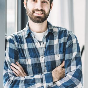 cheerful-man-looking-camera